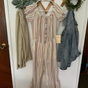 Striped jumpsuit with flare ruffles on the bottom